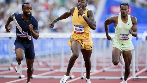 Grant Holloway wins the men's 110-meter hurdles final during the U.S. Track and Field Olympic Team Trials Friday, June 28, 2024, in Eugene, Ore. (AP Photo/George Walker IV)