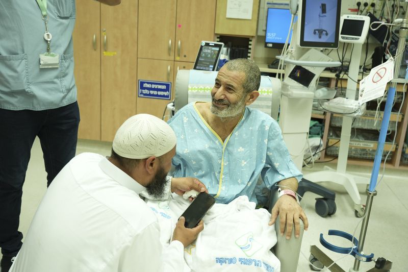 In this photo released by the Israel Prime Minister Office on Tuesday, Aug. 27, 2024, Kaid Farhan Al-Qadi, 52, who was held hostage by Hamas militants in Gaza sits in a room at the Soroka Medical Center in Beersheba, Israel. (Israel Prime Minister Office via AP)