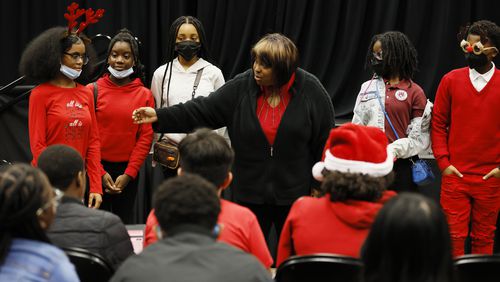 Middle school theater teacher Fredena Williams instructs her students during a drama class on Tuesday, Dec. 13, 2022. Utopian Academy is partnering with Trilith Studios, the home of Marvel and DC blockbusters, in teaching young children about film and TV. (Miguel Martinez / miguel.martinezjimenez@ajc.com)