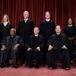 FILE - Members of the Supreme Court sit for a new group portrait following the addition of Associate Justice Ketanji Brown Jackson, at the Supreme Court building in Washington, Oct. 7, 2022. Bottom row, from left, Associate Justice Sonia Sotomayor, Associate Justice Clarence Thomas, Chief Justice of the United States John Roberts, Associate Justice Samuel Alito, and Associate Justice Elena Kagan. Top row, from left, Associate Justice Amy Coney Barrett, Associate Justice Neil Gorsuch, Associate Justice Brett Kavanaugh, and Associate Justice Ketanji Brown Jackson. (AP Photo/J. Scott Applewhite, file)