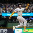 Milwaukee Brewers' Garrett Mitchell celebrates afrer hitting a two-run home run during the eighth inning of Game 2 of a National League wild card baseball game against the New York Mets Wednesday, Oct. 2, 2024, in Milwaukee. (AP Photo/Morry Gash)