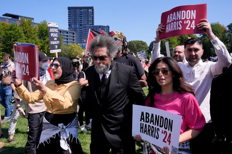 Progressive activist Cornel West watches a demonstration prior to in march to the Democratic National Convention Monday, Aug. 19, 2024, in Chicago. (AP Photo/Alex Brandon)