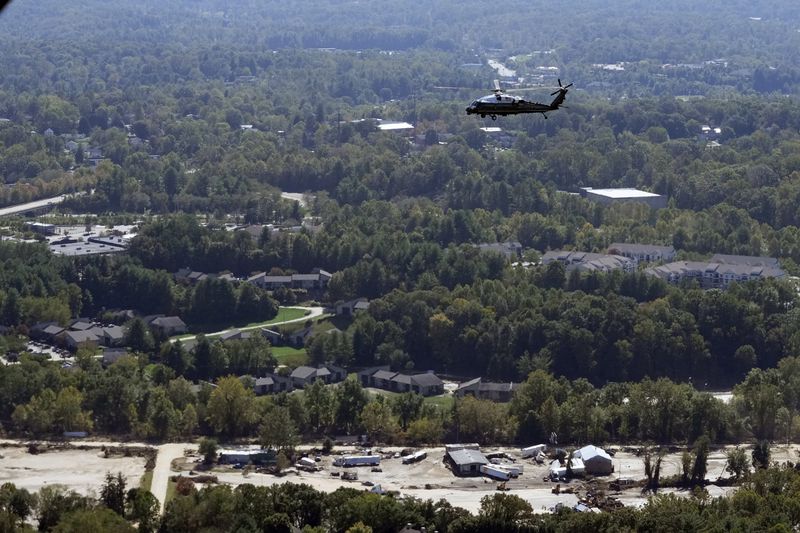 Marine One, with President Joe Biden on board, flies around areas impacted by Hurricane Helene over Asheville, N.C., Wednesday, Oct. 2, 2024. (AP Photo/Susan Walsh) (AP Photo/Susan Walsh)