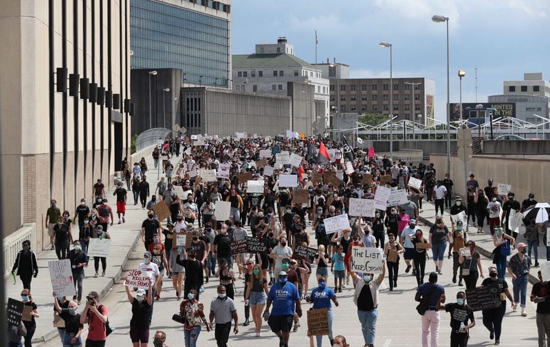 After a peaceful march the Georgia State Capitol that swelled into the hundreds,  protesters returned to the area around the Centennial Olympic Park and CNN Center on Friday, May 29, 2020. (Photo: Alyssa Pointer / alyssa.pointer@ajc.com)