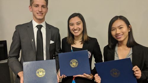 L-R: Matthew Lescota of Brookwood HS, Shama Khan of Central Gwinnett HS, and GCPS Career and Technical Education Student of the Year Juliet La of Discovery HS. Courtesy of Gwinnett County Public Schools