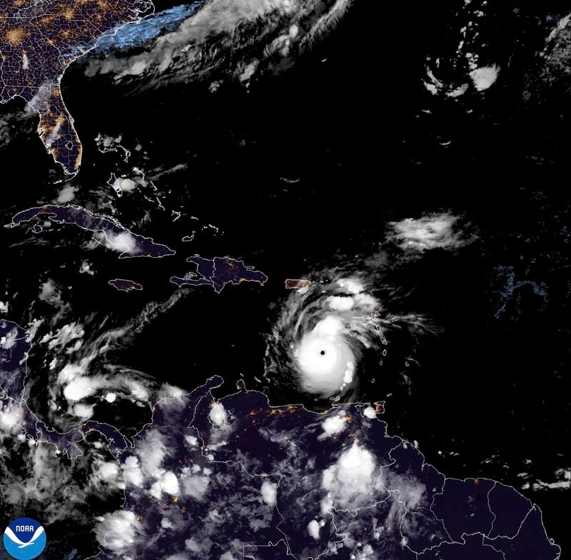 This National Oceanic and Atmospheric Administration satellite image taken at 10:50pm EDT shows hurricane Beryl, center, as it moves across the Caribbean on Monday, July 1, 2024. Hurricane Beryl has strengthened to Category 5 status as it crossed islands in the southeastern Caribbean. (NOAA via AP)