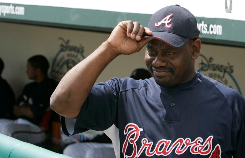 Atlanta Braves' Marquis Grissom looks at the Houston Astros dugout before the Braves play the Houston Astros in a spring training baseball game in 2008, in Lake Buena Vista, Fla. (AP Photo/Tony Dejak)
