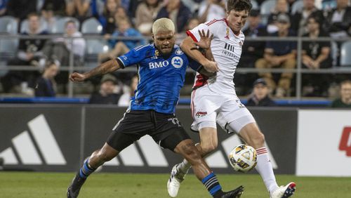 CF Montreal's Josef Martinez, left, battles San Jose Earthquakes' Daniel Munie during the first half of an MLS soccer match in Montreal, Saturday, September 28, 2024. (Peter McCabe/The Canadian Press via AP)