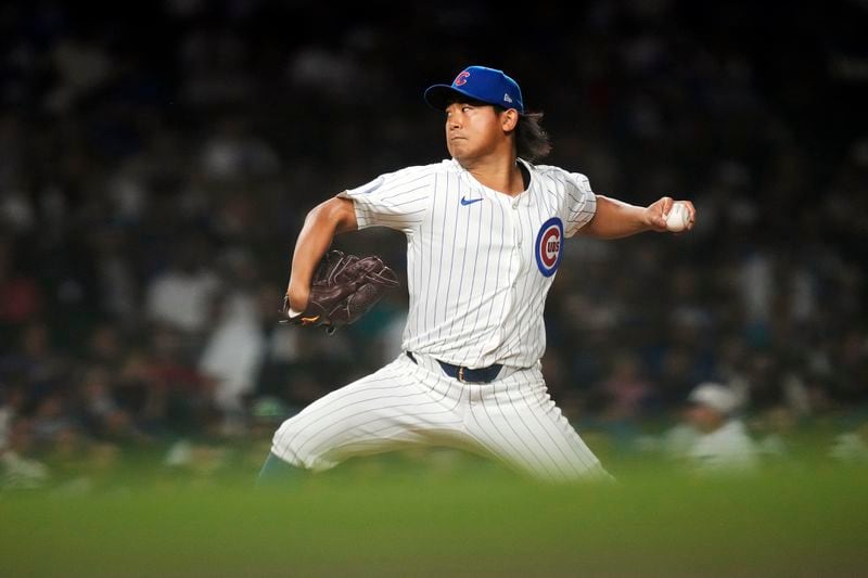 Chicago Cubs pitcher Shota Imanaga throws during the sixth inning of a baseball game against the Pittsburgh Pirates, Wednesday, Sept. 4, 2024, in Chicago. (AP Photo/Charles Rex Arbogast)