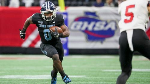 Cedar Grove running back Boden Walker (0) runs for yards during the second half against Savannah Christian in the Class 3A GHSA State Championship game at Mercedes-Benz Stadium, Wednesday, December. 13, 2023, in Atlanta. Walker is a junior Georgia commitment. (Jason Getz / Jason.Getz@ajc.com)