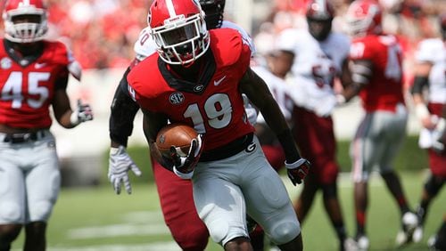 Rico Johnson moved from wide receiver to defensive back over the summer and has played in all four of the Bulldogs’ games as a reserve cornerback.