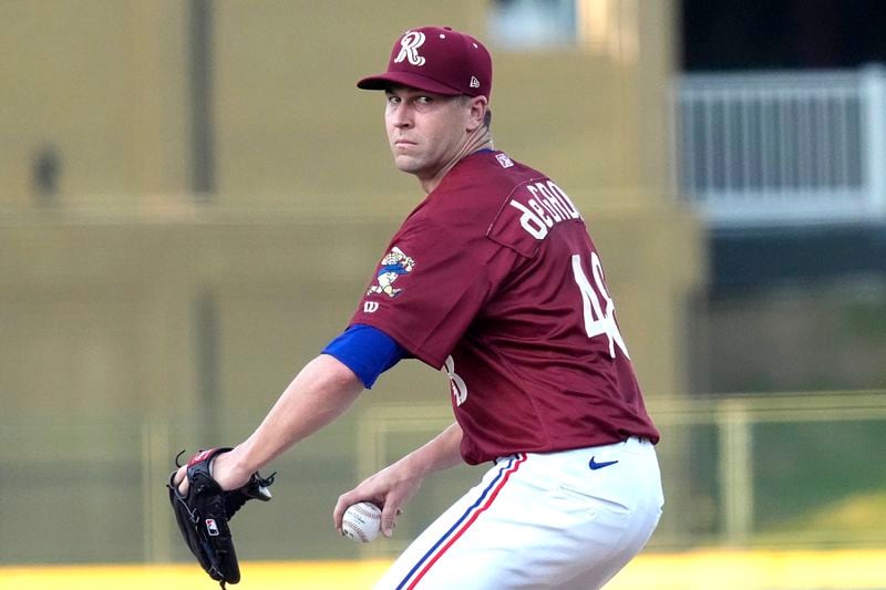 Texas Rangers pitcher Jacob deGrom winds up to throw during his rehab start for a Frisco Rough Riders baseball game in Frisco, Texas, Thursday, Aug. 22, 2024, (AP Photo/LM Otero)