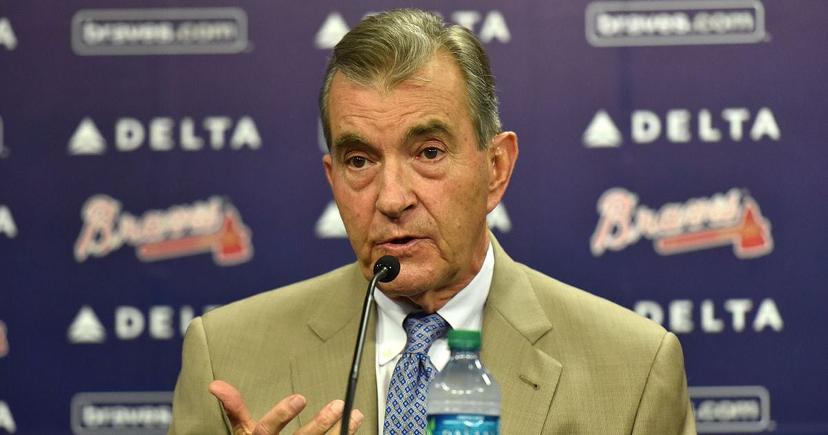 Atlanta Braves - Braves president John Schuerholz displays his