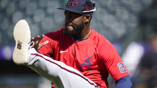 Atlanta Braves right fielder Michael Harris II warms up before a baseball game against the Colorado Rockies Thursday, June 2, 2022, in Denver. (AP Photo/David Zalubowski)