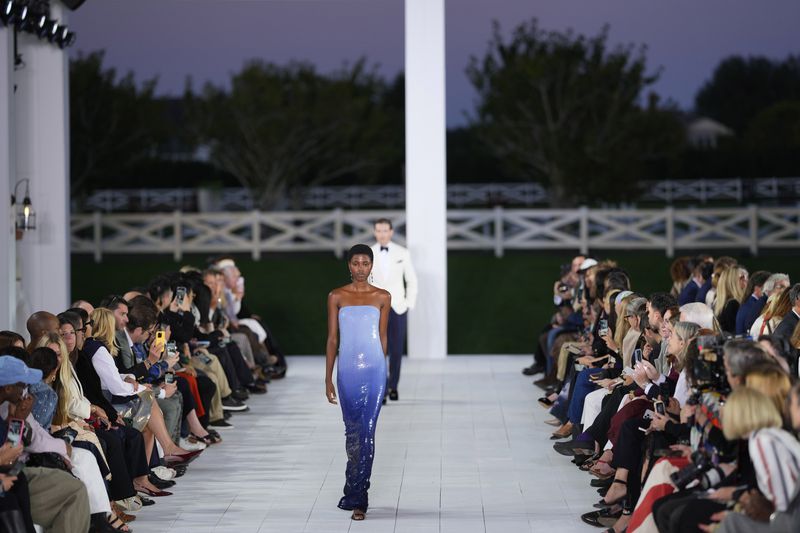 Models walk the runway during the Ralph Lauren Spring/Summer 2025 fashion show as part of New York Fashion Week on Thursday, Sept. 5, 2024, at Khalily Stables in Bridgehampton, N.Y. (Photo by Charles Sykes/Invision/AP)