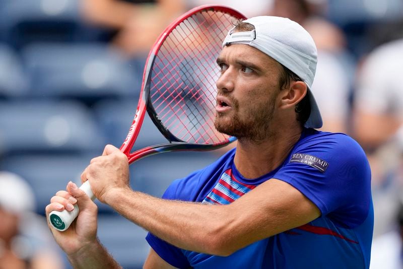 Tomas Machac, of the Czech Republic, returns a shot to Sebastian Korda, of the United States during the second round of the U.S. Open tennis championships, Thursday, Aug. 29, 2024, in New York. (AP Photo/Kirsty Wigglesworth)