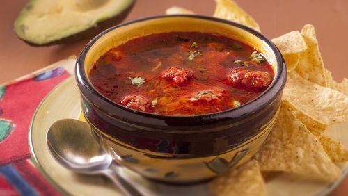 Black bean soup is a great dish. But what if you add chorizo meatballs and sauteed poblanos? Top it off with cilantro and avocado, and you really have something. (Bill Hogan/Chicago Tribune/TNS)