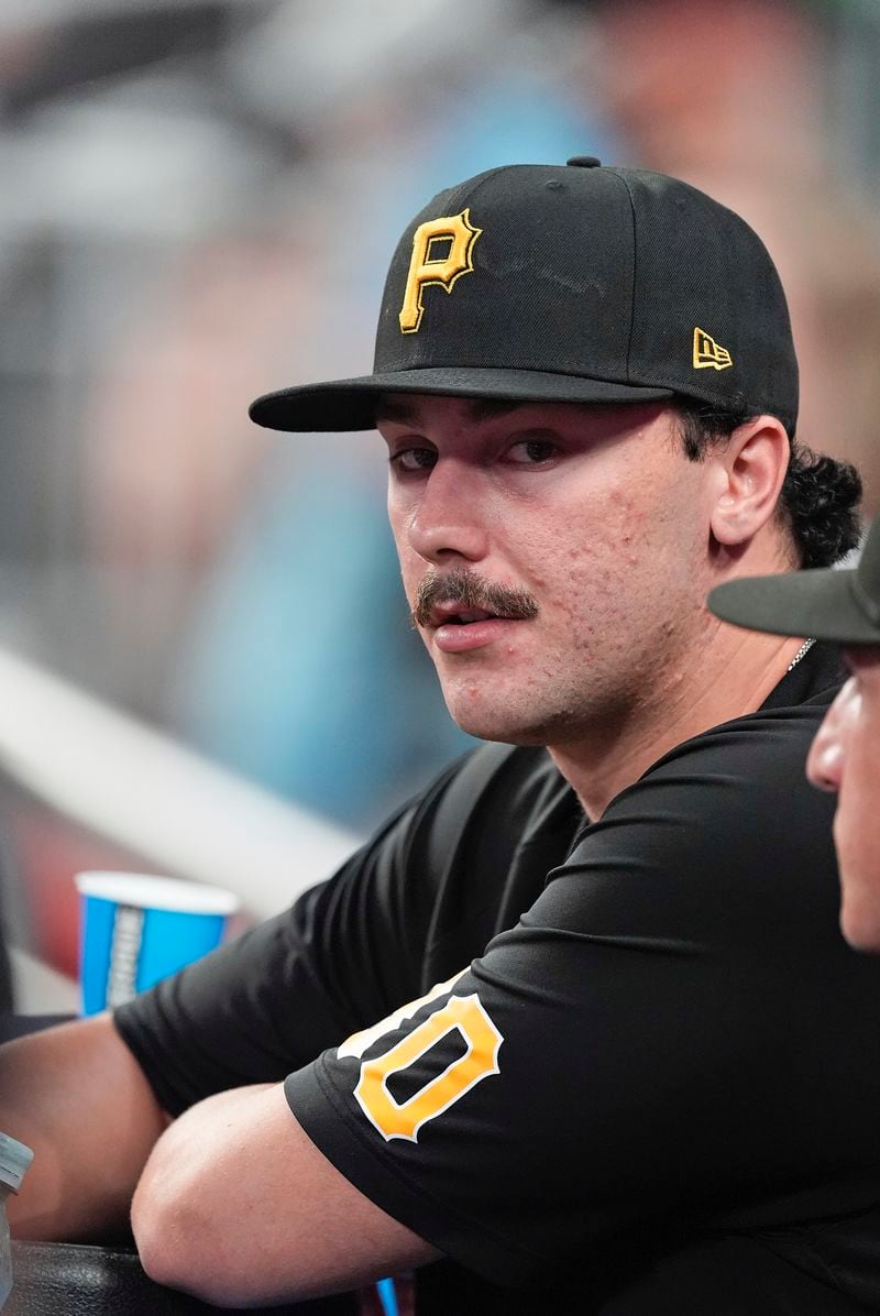 Pittsburgh Pirates starting pitcher Paul Skenes watches from the dugout during a baseball game against the Atlanta Braves Friday, June 28, 2024, in Atlanta. Skenes was not in the lineup. (AP Photo/John Bazemore)