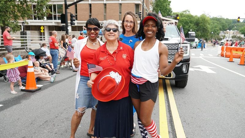 Cobb County Chairwoman Lisa Cupid (right) joins Commissioners Keli Gambrill, JoAnn Birrell and Monique Sheffield in the city of Marietta's July 4 parade in 2023. Cobb County