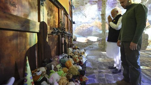 This photograph provided by Indian Prime Minister’s office shows Indian Prime Minister Narendra Modi, second right, and Ukrainian President Volodymyr Zelenskyy, right at the Martyrologist Exposition in Kyiv, Ukraine, Friday, Aug.23, 2024. (Indian Prime Minister’s office via AP)