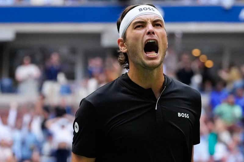 Taylor Fritz, of the United States, reacts in the third set against Jannik Sinner, of Italy, during the men's singles final of the U.S. Open tennis championships, Sunday, Sept. 8, 2024, in New York. (AP Photo/Kirsty Wigglesworth)