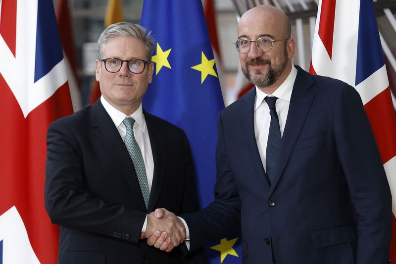 Britain's Prime Minister Keir Starmer, left, is welcomed by European Council President Charles Michel to the European Commission headquarters in Brussels, Wednesday, Oct. 2, 2024.(AP Photo/Omar Havana)