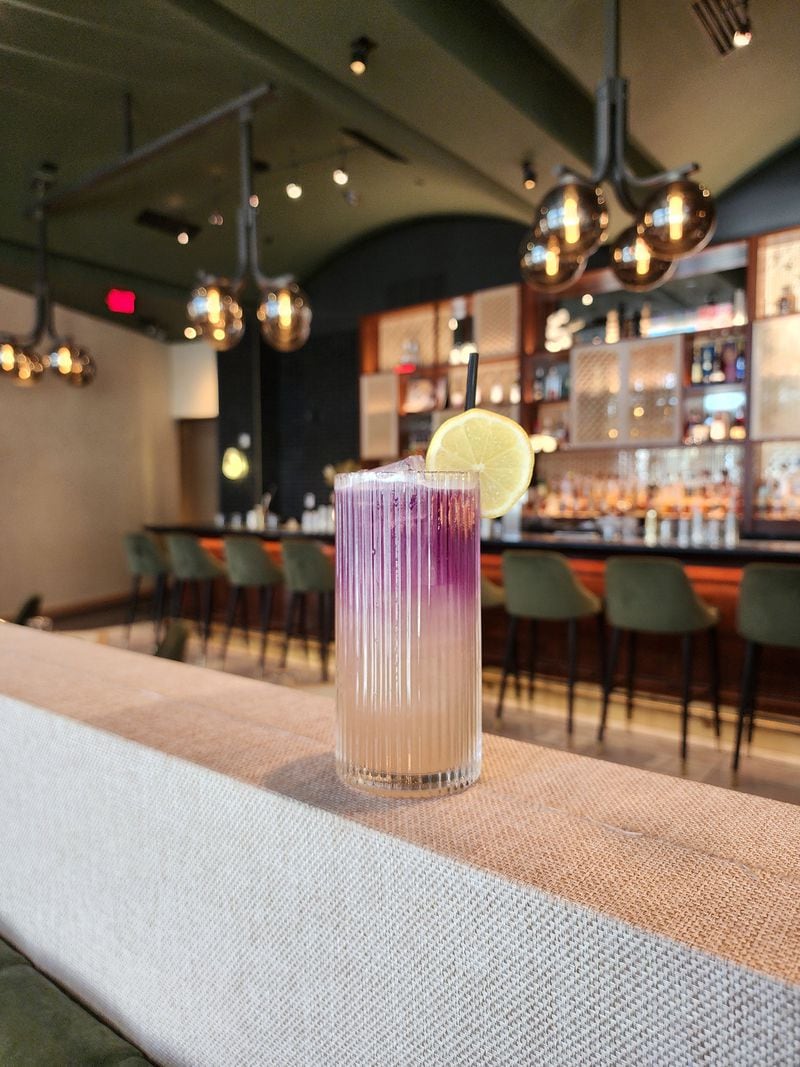 Butterfly pea flower is what gives Brush Sushi's eastern eclipse cocktail its violet color. (Courtesy of Holly Paige)