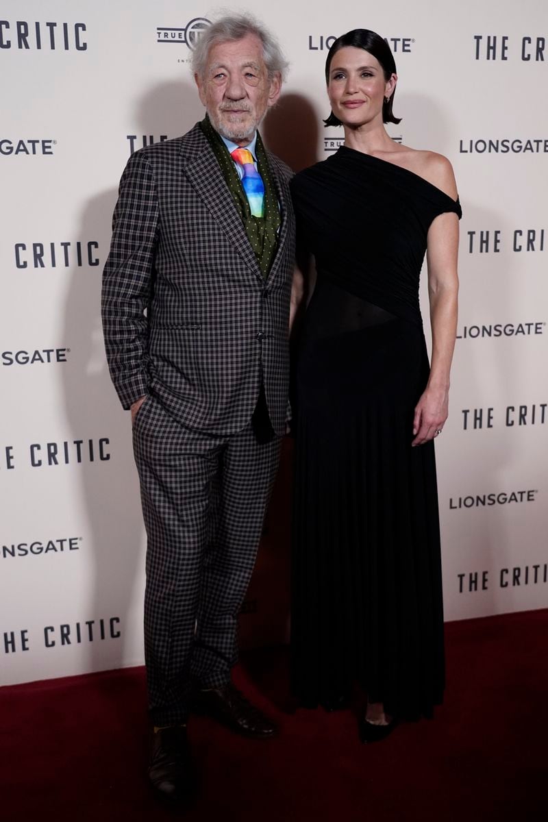 Ian McKellen, with Gemma Arterton, as they pose for photographers upon arrival at the European Premiere of the The Critic, In London, Monday, Sept. 2, 2024. (AP Photo/Alberto Pezzali)