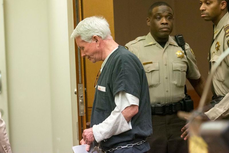 Claud "Tex" McIver is escorted out of the courtroom after being sentenced to life in prison with the possibility of parole in front of Fulton County Chief Judge Robert McBurney at the Fulton County courthouse in Atlanta on May 23, 2018. (Alyssa Pointer/Atlanta Journal-Constitution/TNS)