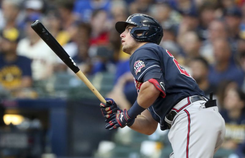 Braves third baseman Austin Riley (27) hits a solo homer in the sixth inning.  Curtis Compton / Curtis.Compton@ajc.com 