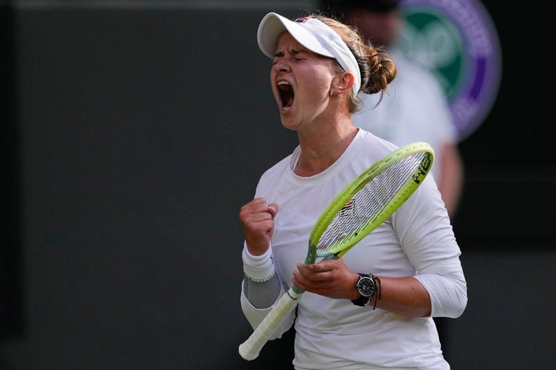 Barbora Krejcikova of the Czech Republic reacts during her semifinal match against Elena Rybakina of Kazakhstan at the Wimbledon tennis championships in London, Thursday, July 11, 2024. (AP Photo/Alberto Pezzali)