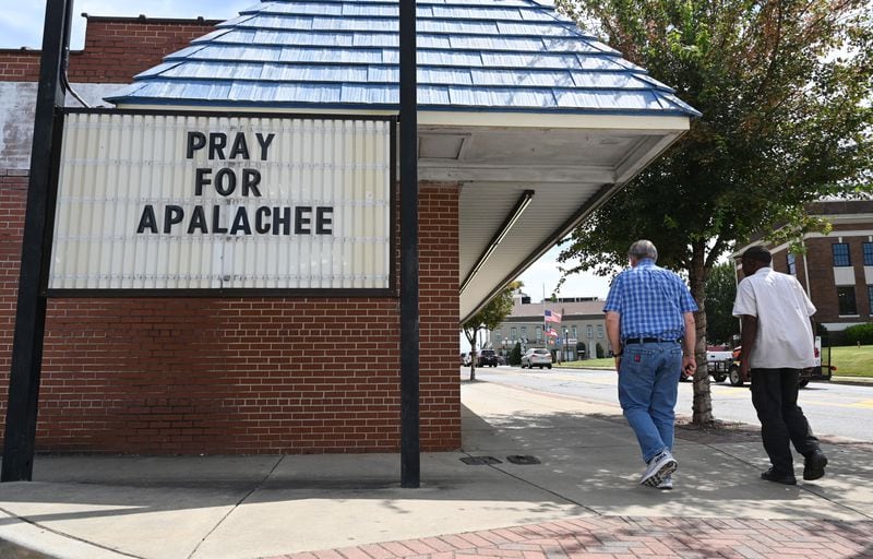 A sign in downtown Winder shows community support for Apalachee High School on Sept. 6. (Hyosub Shin/AJC)