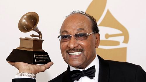 FILE - Duke Fakir holds his life time achievement award backstage at the 51st Annual Grammy Awards in Los Angeles on Feb. 8, 2009. Fakir wrote a memoir, "I'll Be There: My Life With The Four Tops." (AP Photo/Matt Sayles, File)