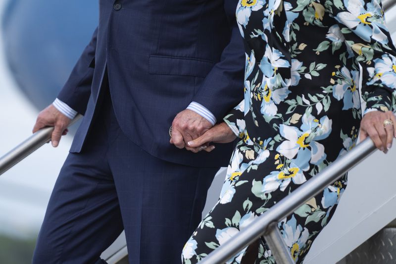 President Joe Biden, left, and first lady Jill Biden arrive at McGuire Air Force Base, Saturday, June 29, 2024, in Burlington County, N.J. (AP Photo/Evan Vucci)