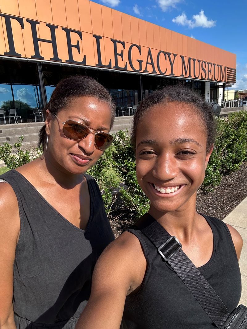 Nedra Rhone and her daughter, Layla, 12, visit the Legacy Museum in Montgomery during a weeklong tour of Black history museums.