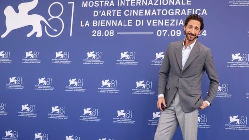 Adrien Brody poses for photographers at the photo call for the film 'The Brutalist' during the 81st edition of the Venice Film Festival in Venice, Italy, on Sunday, Sept. 1, 2024. (Photo by Vianney Le Caer/Invision/AP)