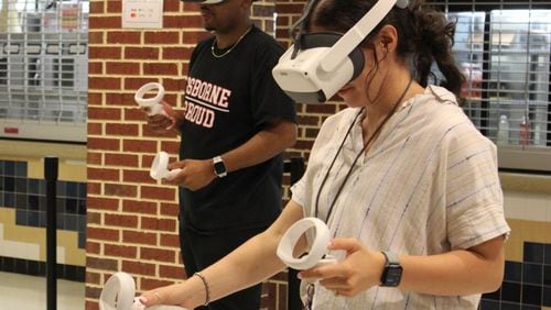 Roughly 400 of Cobb’s math and science teachers were trained to use Prisms VR headsets Monday at Wheeler High School. (Photo Courtesy of Annie Mayne)