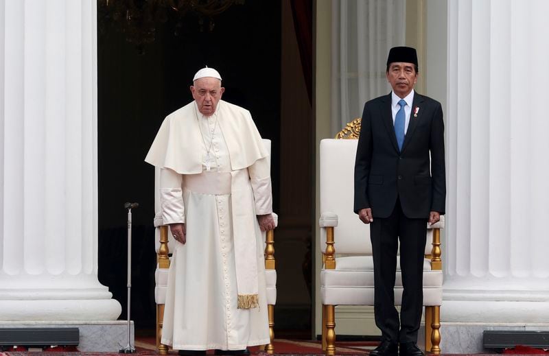 Pope Francis, left, and Indonesian President Joko Widodo attend a welcome ceremony at the Istana Merdeka Presidential Palace in Jakarta Wednesday, Sept. 4, 2024. (Adi Weda/Pool Photo via AP)