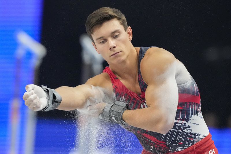 Brody Malone competes on the pommel horse at the United States Gymnastics Olympic Trials on Saturday, June 29, 2024, in Minneapolis. (AP Photo/Charlie Riedel)