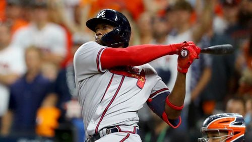 11/2/21 - Houston, Tx. - Atlanta Braves designated hitter Jorge Soler hits a three-run home run against Houston Astros starting pitcher Luis Garcia (not pictured) during the third inning in game 6 of the World Series at Minute Maid Park, Tuesday, November 2, 2021, in Houston, Tx. Curtis Compton / curtis.compton@ajc.com