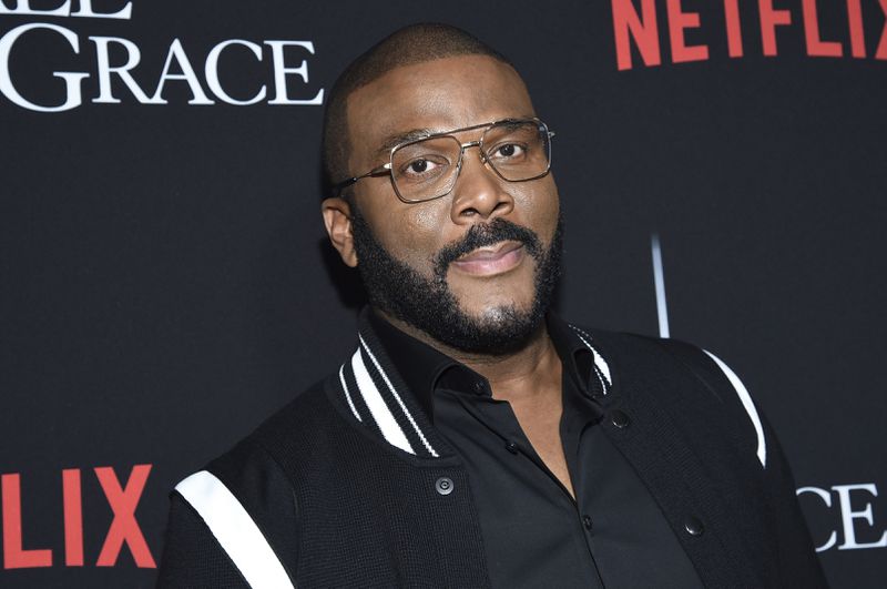 Tyler Perry wrote “we must never give up” in a heartfelt first-person essay in People magazine detailing his thoughts on racial injustice and police brutality against unarmed black people in America.