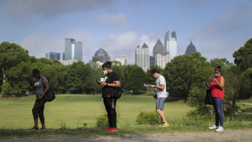 June 9, 2020 Atlanta: Voters had a long wait (some 2-3 hours) at the Park Tavern polling place located at 500 10th St NE, on Tuesday, June 9, 2020 in Atlanta. Many voters said they requested absentee ballots but never received them. Two lines, 300-yards long each formed parallel to Piedmont park in the parking lot as people patiently waited to vote. Over 1.2 million people had already voted before the polls opened on Tuesday, three-quarters of them with absentee-by-mail ballots, allowing them to avoid human contact at the polls. Voters will decide on many candidates, from president to county sheriff. The ballot also includes races for U.S. Senate, U.S. House and the Georgia General Assembly. JOHN SPINK/JSPINK@AJC.COM