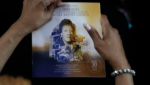 A person holds a program as King’s family and members of the community gather to remember the life and legacy of MLK’s mother on the 50th anniversary of her murder at Ebenezer Baptist Church on Sunday, June 30, 3034, in Atlanta.
(Miguel Martinez / AJC)