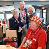 Nancy Burton (clockwise from left), Pat Garland, 
Gayle Brown and Jim Burton mingle before Georgia delegation breakfast at Lake Lawn Resort, Monday, July 15, 2024, in Delavan, WI. (Hyosub Shin / AJC)