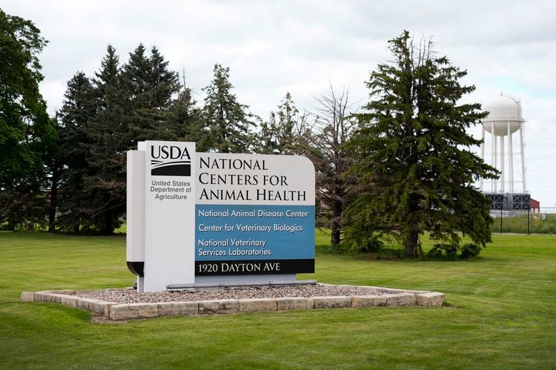 A sign stands outside of the National Centers for Animal Health campus, Tuesday, Aug. 6, 2024, in Ames, Iowa. (AP Photo/Charlie Neibergall)