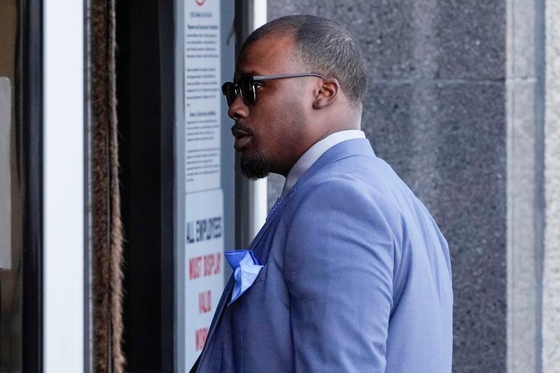 Former Memphis police officer Justin Smith arrives at the federal courthouse for the second day of jury selection for the trial in the Tyre Nichols case Tuesday, Sept. 10, 2024, in Memphis, Tenn. (AP Photo/George Walker IV)