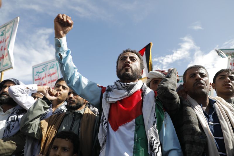 Houthi supporters attend an anti-Israel and anti-US rally in Sanaa, Yemen, Friday, Aug. 23, 2024. (AP Photo/Osamah Abdulrahman)