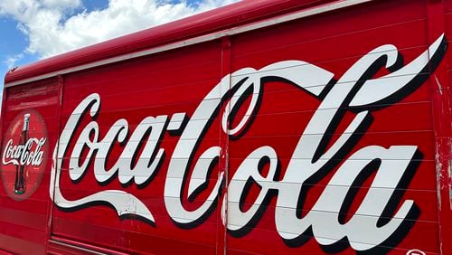 Atlanta-based beverage giant Coca-Cola reported better than expected earnings Tuesday. (AP Photo/David Zalubowski, File)