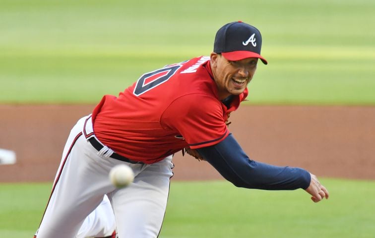 Atlanta, United States. 09th Apr, 2021. Atlanta Braves starting pitcher  Charlie Morton throws in the first inning of their Opening Day against the  Philadelphia Phillies at Truist Park in Atlanta on Friday