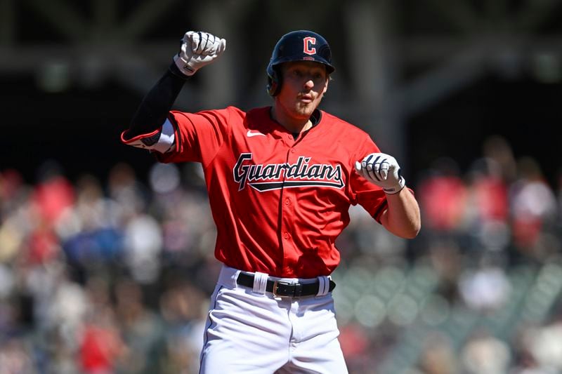 Cleveland Guardians' Kyle Manzardo celebrates hitting a solo home run during the first inning of a baseball game against the Minnesota Twins, Thursday, Sept. 19, 2024, in Cleveland. (AP Photo/Nick Cammett)